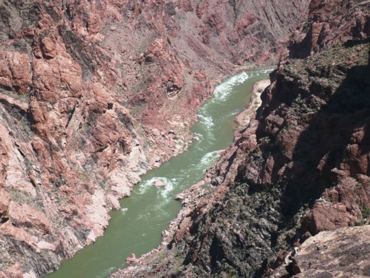 Mile 19.3, 12:47 p.m. - Peering over cliff down to Colorado River between Agate and Slate Canyons
